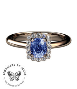 ring med diamanter och blå safir